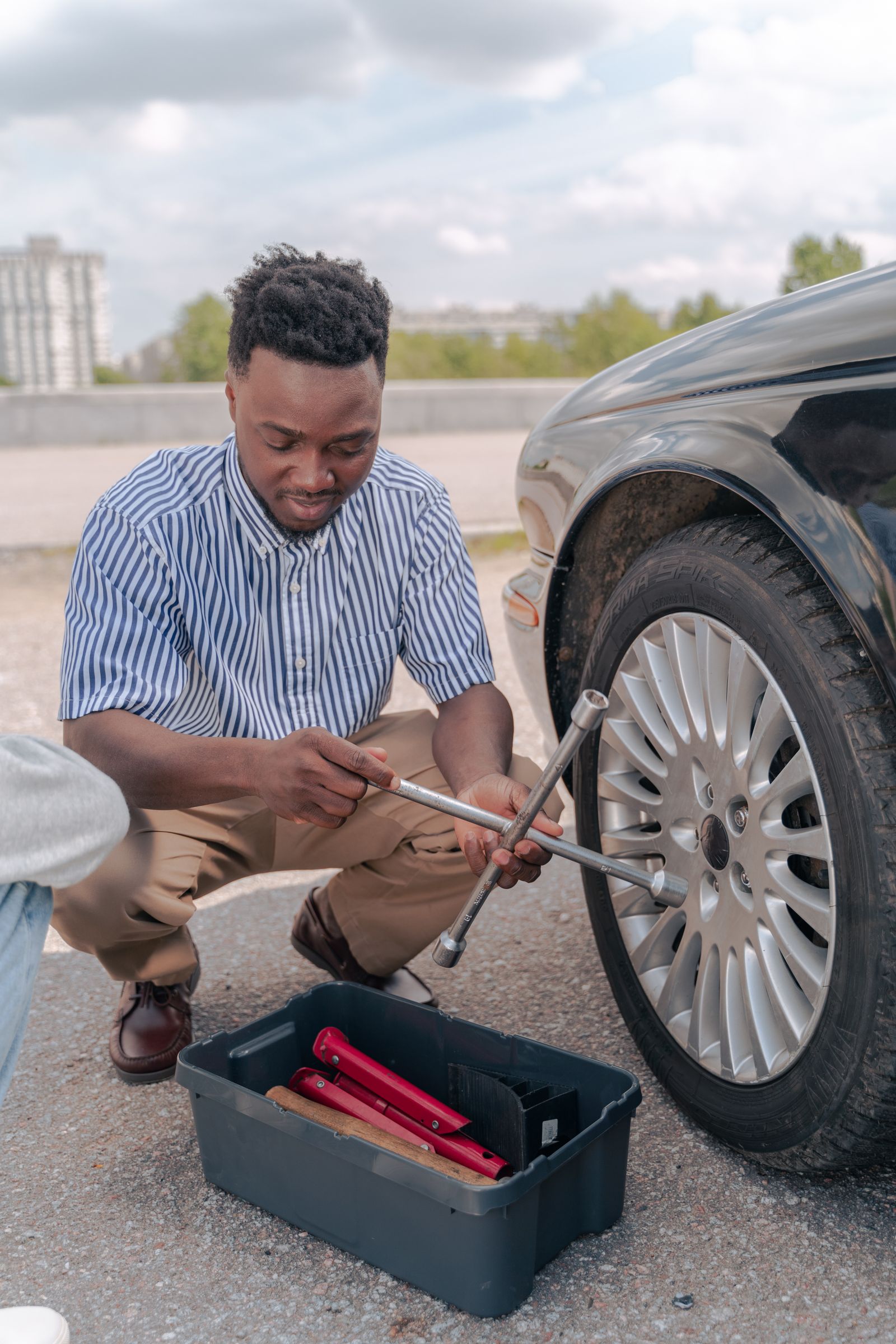 Tyre being changed at the roadside in Perth